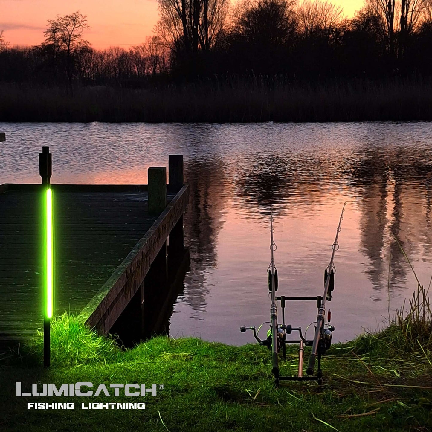 LumiCatch BuzzOff mosquito-repelling light by a fishing spot, enhancing visibility at sunset for peaceful fishing.